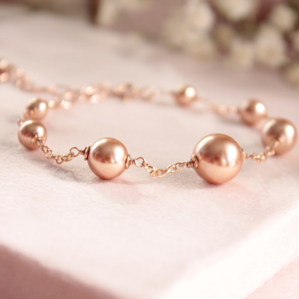 Bracciale perle oro rosa degradè